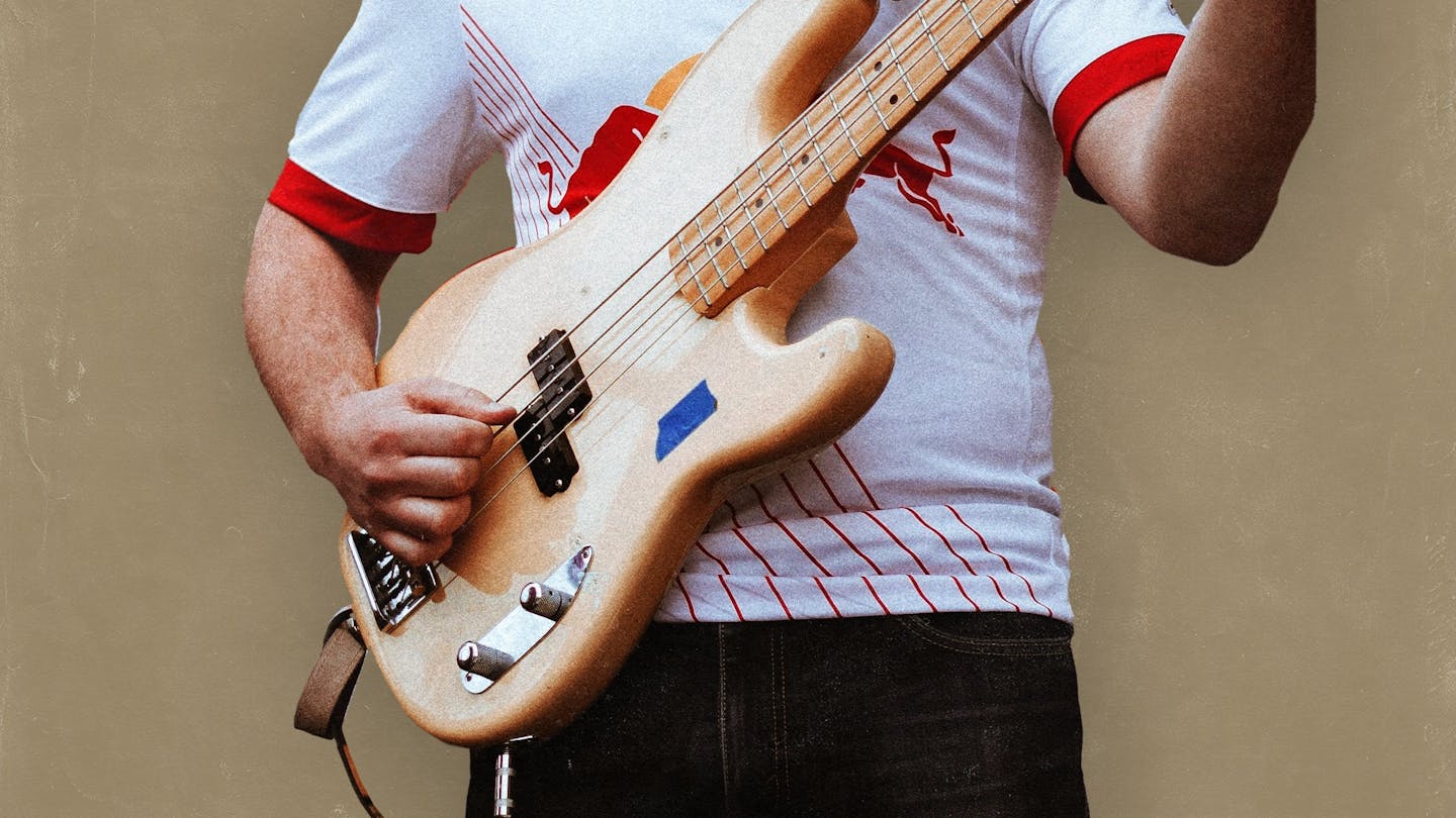 Man Playing Bass | DI Bass: The Producer's Guide to Recording Bass Guitar at Home